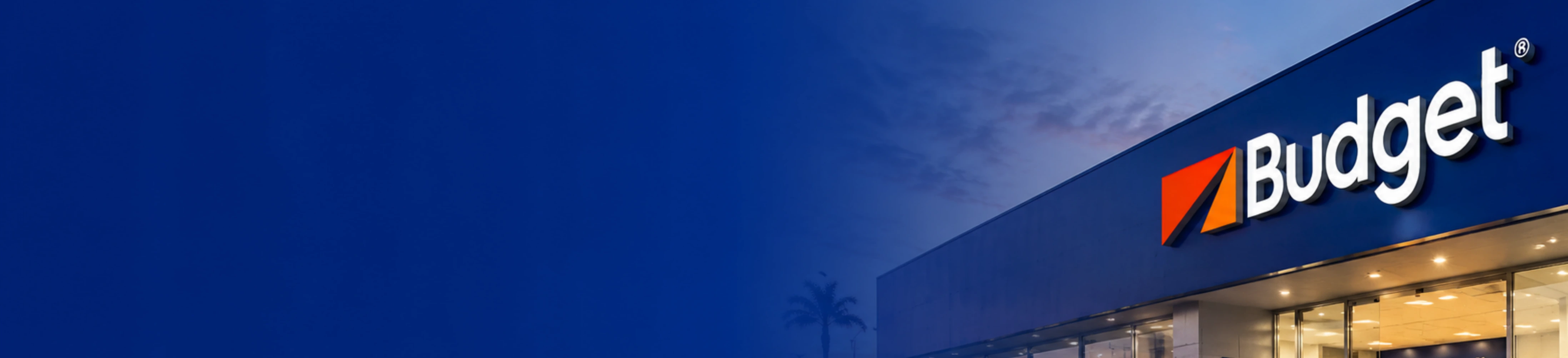 Fachada de sucursal Budget México de noche